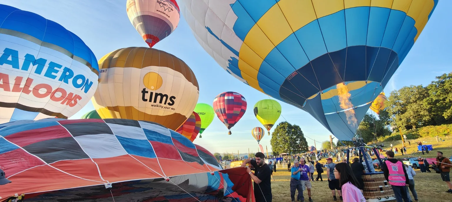 Hot air balloons on the launch field at Bristol International Balloon Fiesta